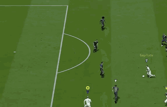 a group of soccer players are playing a game on a field with a yellow star in the middle of the field