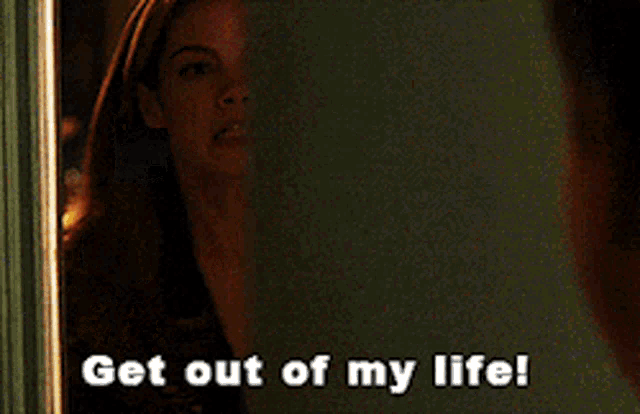 a woman is screaming with the words get out of my life
