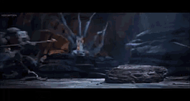 a close up of a person being attacked by a monster in a dark room .