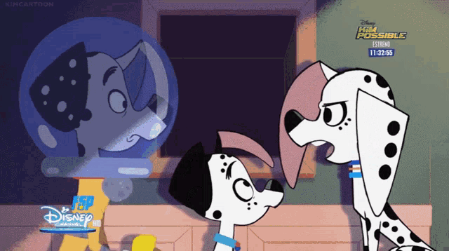 two dalmatian dogs are standing next to each other in front of a screen that says kim possible