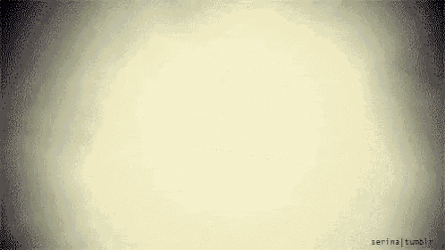 a white background with a gray border and a few dots on it