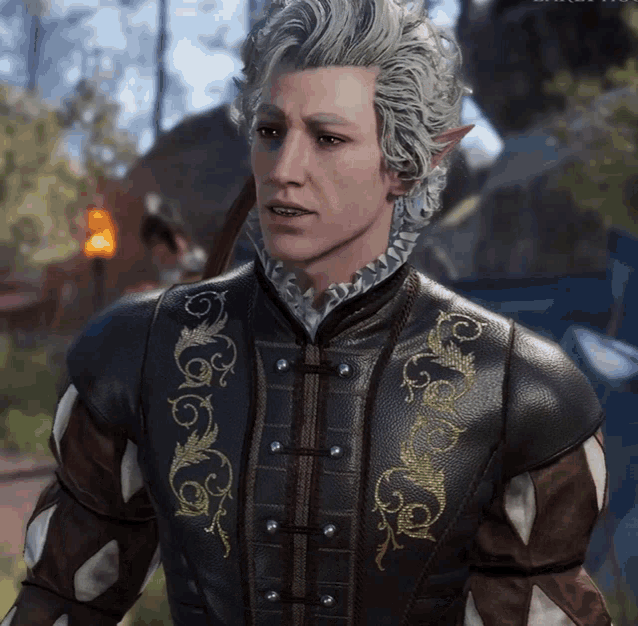 a man with white hair is wearing a black jacket with gold embroidery on the sleeves