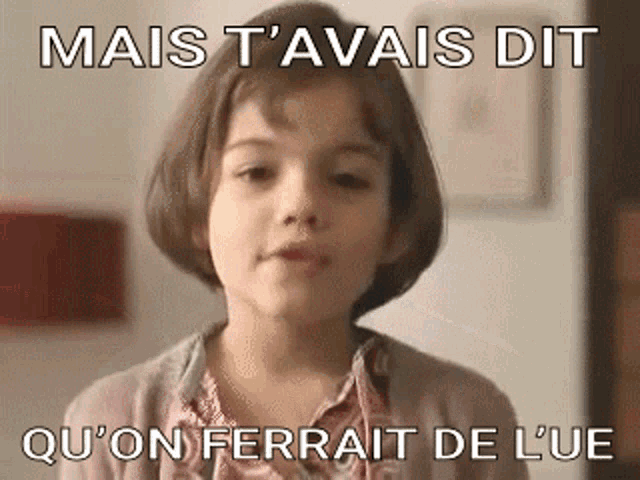 a little girl with a caption that says mais t 'avais dit