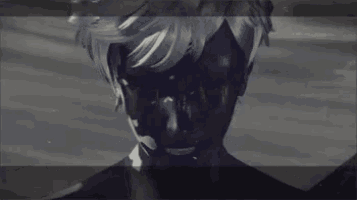 a close up of a person 's face with blood coming out of their mouth .