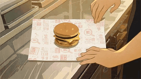 a cartoon drawing of a hamburger on a paper that says beef on it