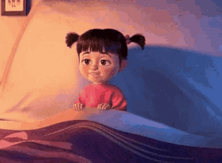 boo from monsters inc is laying in bed