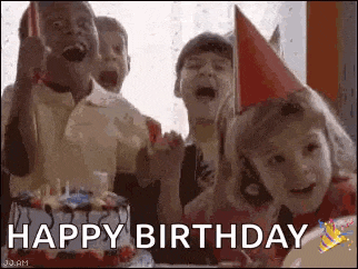a group of children are celebrating a birthday with a cake and confetti .