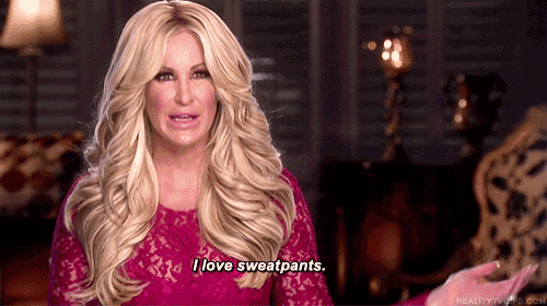 a woman in a pink lace dress says i love sweatpants