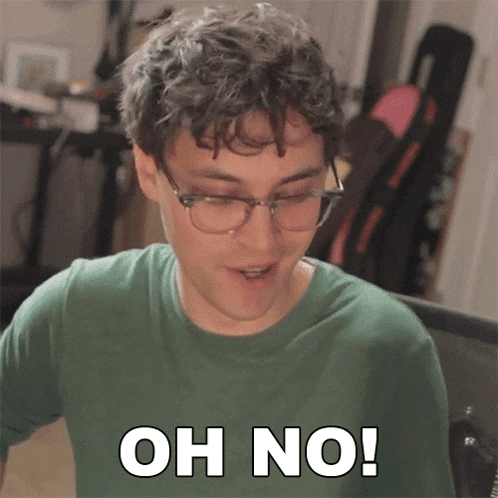 a man wearing glasses and a green shirt is saying " oh no "