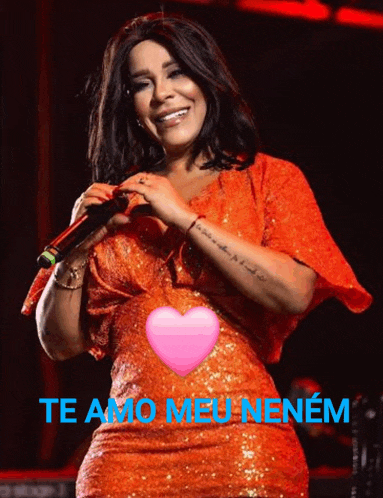a woman in a red dress is singing into a microphone with the words te amo meu nenem written below her