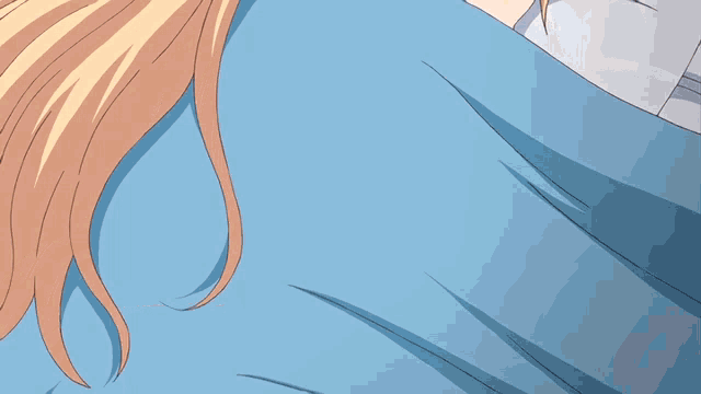 a girl with a cat ear on her head is being held by a boy