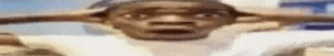 a close up of a man covering his ears with his hands and making a funny face .