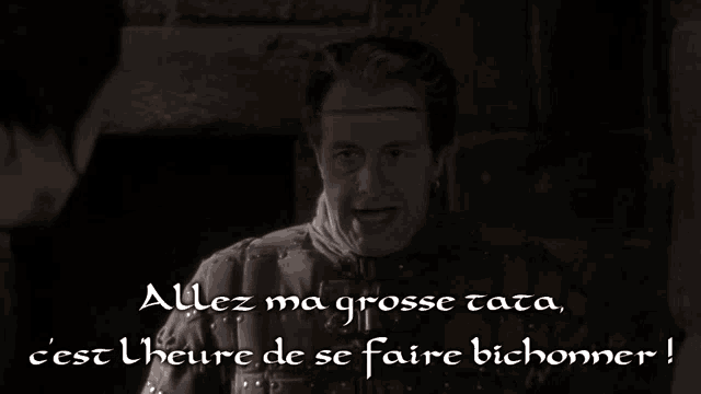 a man with a crown on his head and the words " allez ma grosse tata " on the bottom