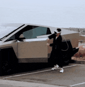 a man wearing a virtual reality headset is standing in front of a futuristic car
