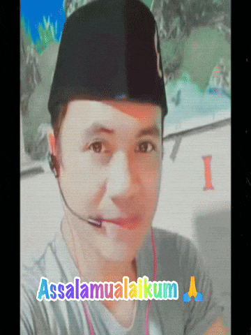 a man wearing a hat and a microphone with the words assalamualaikum above him