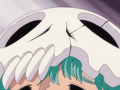 a close up of a person 's face with a skull on it