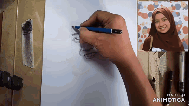 a person is drawing a picture of a girl with the words made in animatica on the bottom right