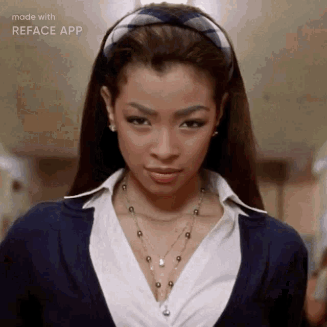a woman wearing a plaid headband and a necklace is made with the reface app