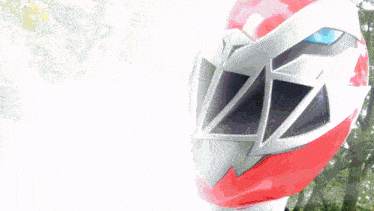 a close up of a red and white helmet on a white background