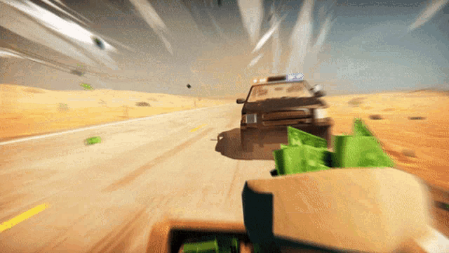 a police car is driving down a desert road with a briefcase full of money in front of it