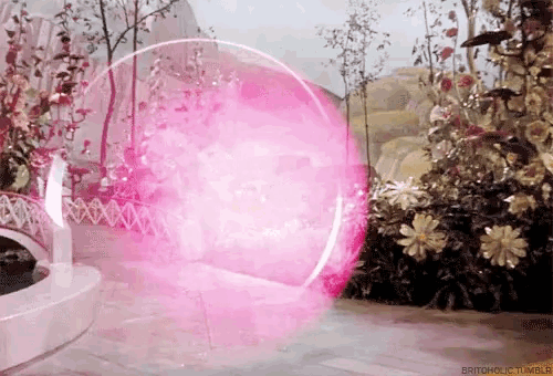 a pink bubble in a garden with britoholic tumblr written on the bottom right