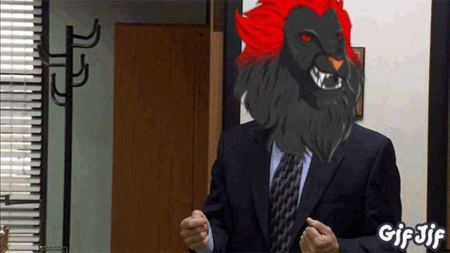 a man in a suit and tie has a lion mask on his face and the words gif jif on the bottom right