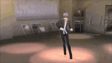 a man is dancing in a room with chairs .