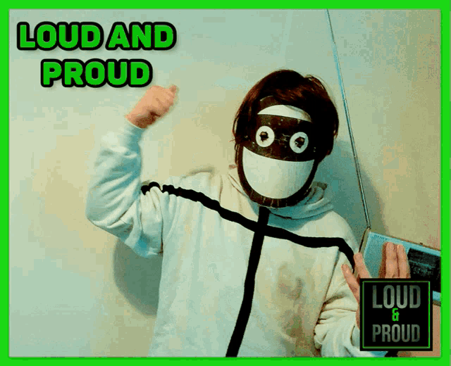 a person wearing a mask with the words " loud and proud " on the top