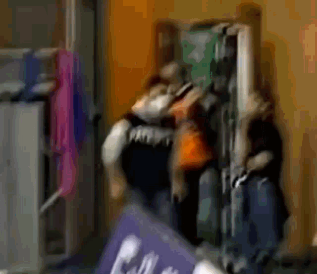 a blurry picture of a person with a shirt that says patriot