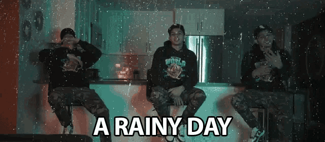 three men are sitting in a kitchen with the words " a rainy day " written above them