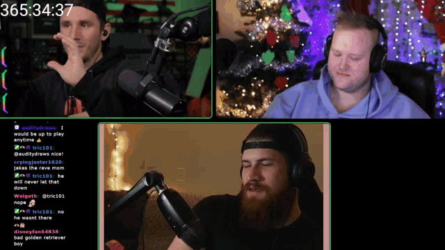two men are sitting in front of a microphone with the time of 365:3437 on the screen