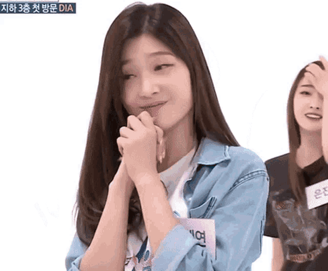 a girl with a name tag that says dia