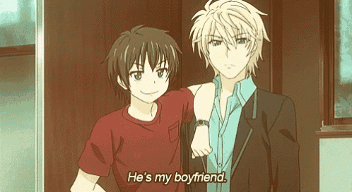 two anime boys are standing next to each other and one of them is talking about his boyfriend .
