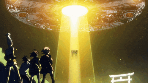 a group of people standing in front of a large object with a light coming from it