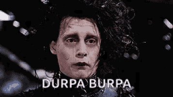 a close up of a person 's face with the words `` durpa burpa '' written in the corner .