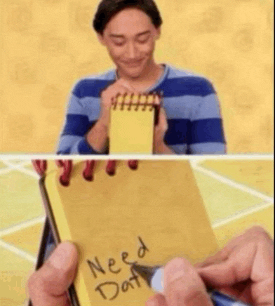 a man in a blue and white striped shirt is holding a yellow notebook that says `` need dat '' .