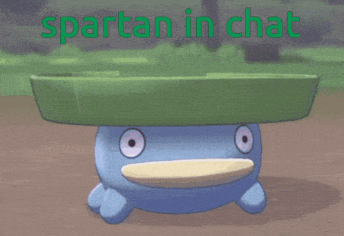 a cartoon frog with a green hat and the words spartan in chat behind it