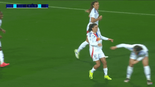 a soccer player wearing a number 10 jersey is hugging another player
