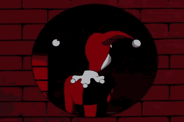 a cartoon of harley quinn in a circle on a brick wall