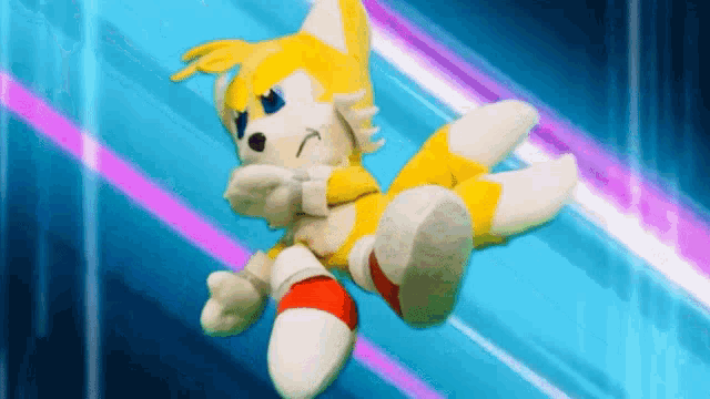 tails from sonic the hedgehog is flying through the air with a blue background