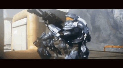 a group of soldiers in armor are standing next to each other in a video game .