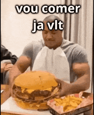 a man is eating a hamburger and french fries with the words vou comer ja vlt below him
