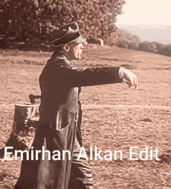 a black and white photo of a man with the name emirhan alkan edit below him