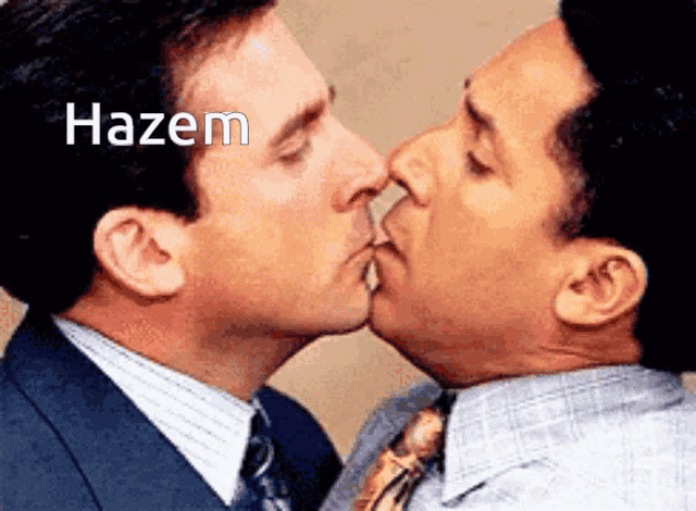 two men are kissing and the word hazem is on the bottom
