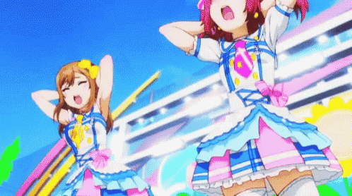 two anime girls are dancing in front of a train .