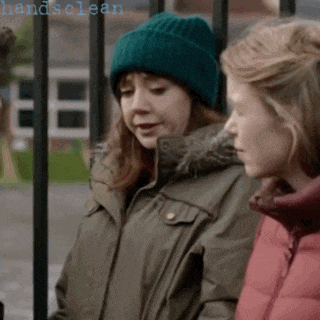 two women are standing next to each other and the word handsclean is on the bottom right