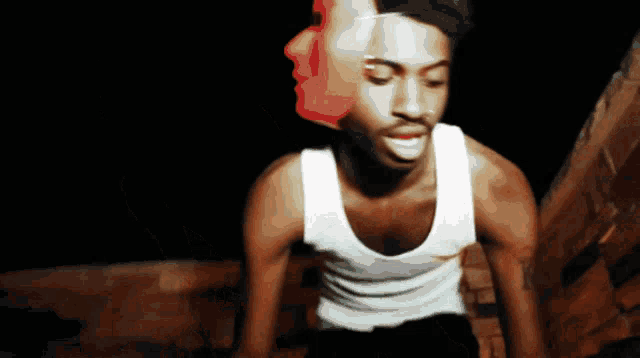 a man in a white tank top has a double face