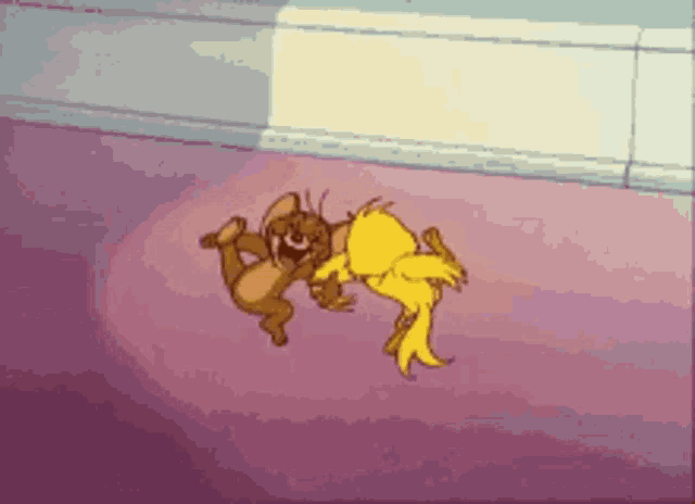 a couple of cartoon characters are dancing on a floor