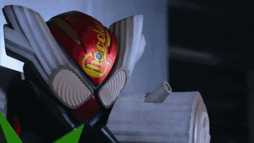a close up of a helmet that says coca cola on it