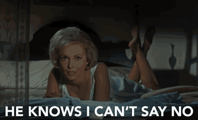 a woman laying on a bed with the words " he knows i can 't say no " below her